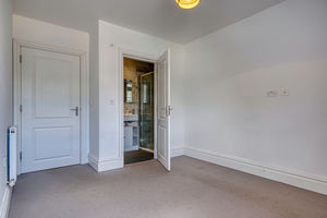 Bedroom One- click for photo gallery